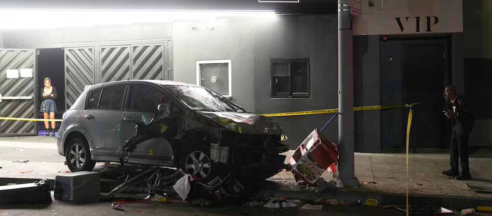 At least 30 injured as car rams into crowd in Los Angeles Los Angeles